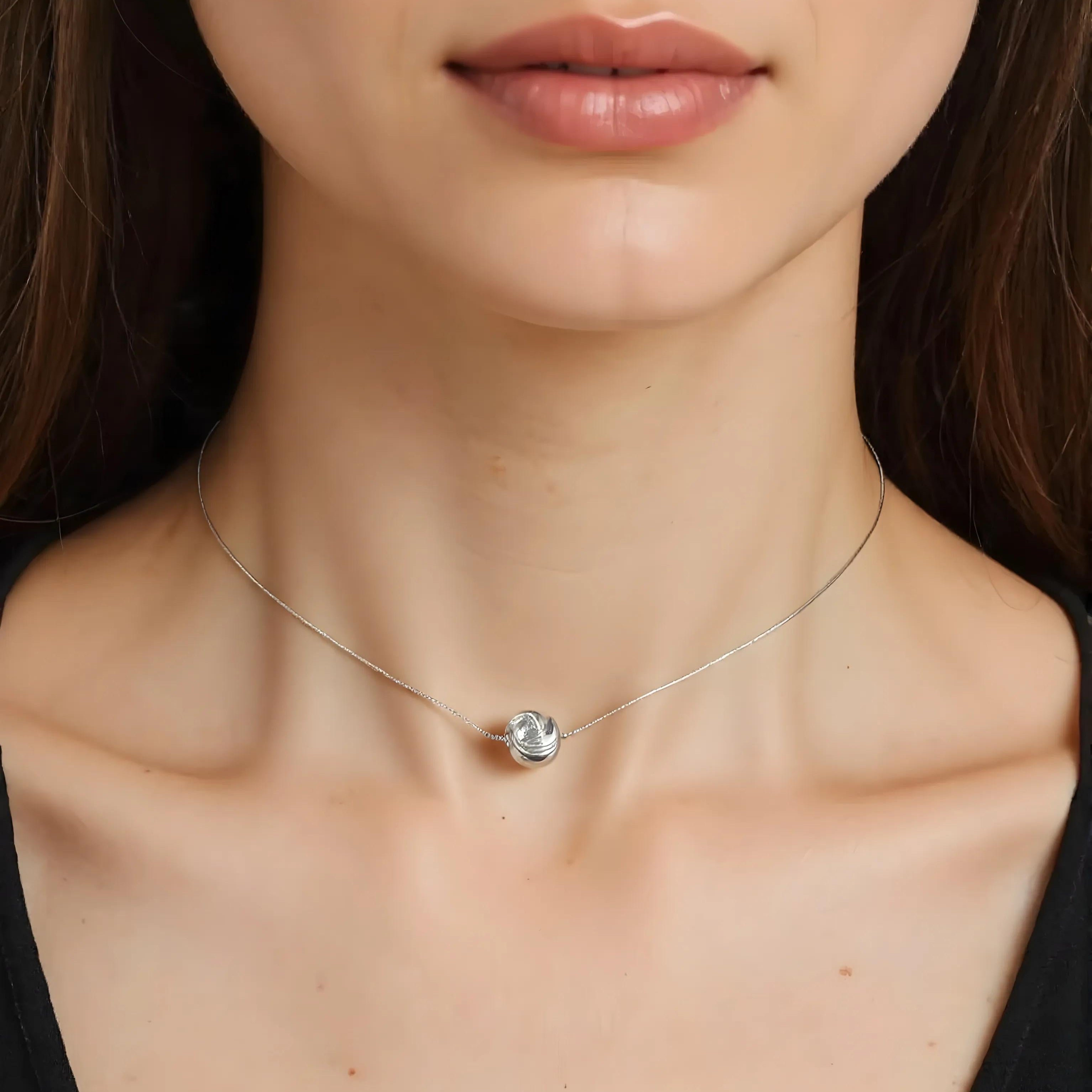 Close-up of Hermin's Tulle Textured Orb Necklace - Mercury in 18k gold vermeil or sterling silver, crafted for elegance and durability