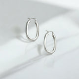 Classic Statement Oval Silver Hoops - Milan made from sterling silver with rhodium finish, minimalist design by Hermin Jewelry