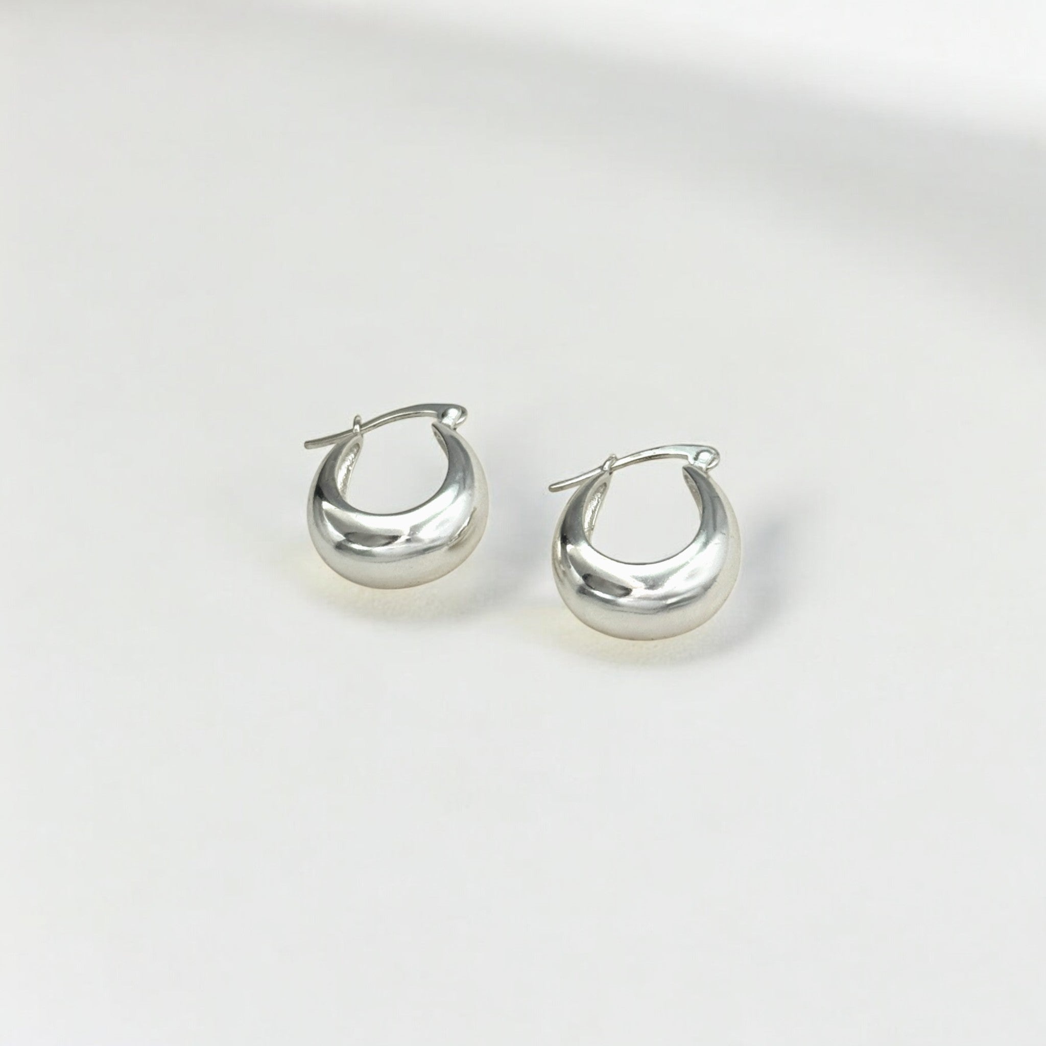 Silver Puffy Hoops - Paris made from sterling silver with rhodium finish, minimalist design by Hermin Jewelry