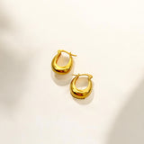 Close-up of Hermin's Gold Puffy Hoops - Paris in 18k gold vermeil over sterling silver, crafted for elegance and durability