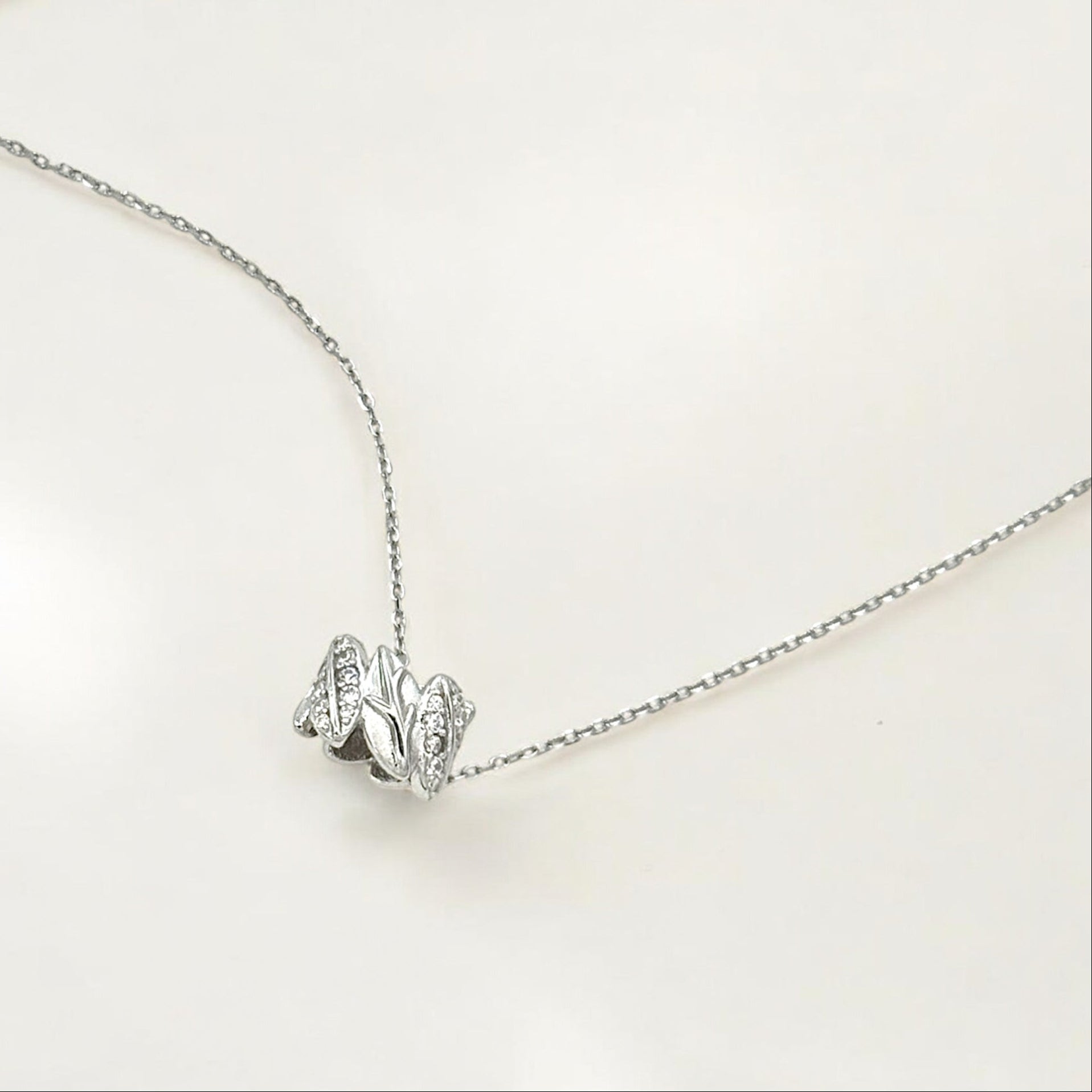 Silver Sparkle Leaf Pendant Necklace - Olivia made from sterling silver with rhodium finish, minimalist design by Hermin Jewelry
