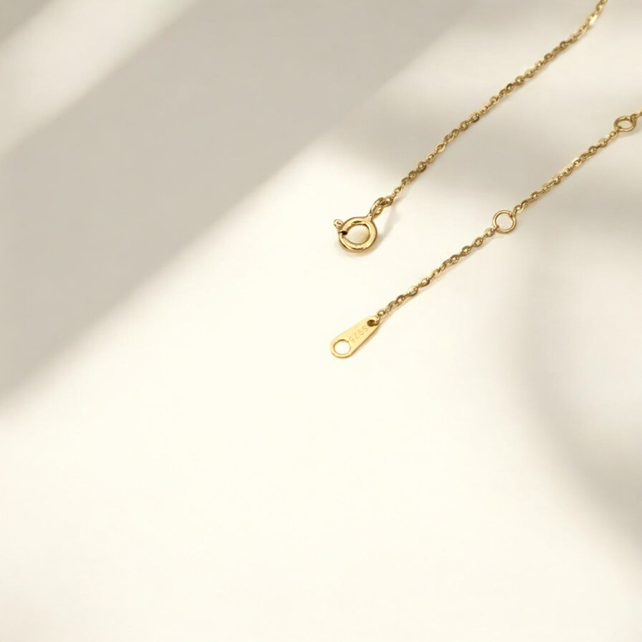 Close-up of Hermin's Eternal Bond - Mini Pavé Link Gold Necklace in 18k gold vermeil over sterling silver, crafted for elegance and durability