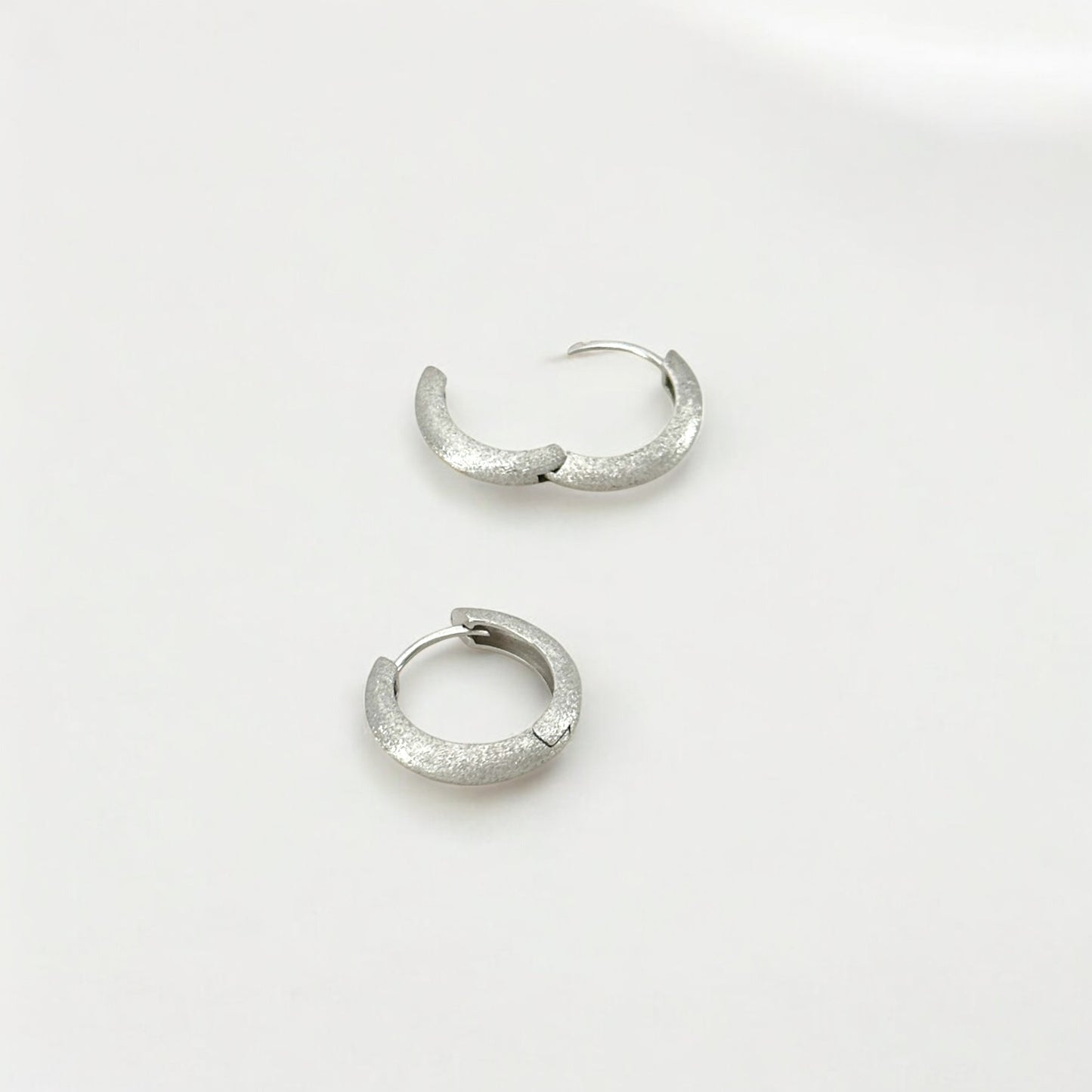 Tulle Textured Silver Everyday Hoops - 16mm made from sterling silver with rhodium finish, minimalist design by Hermin Jewelry