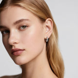 Close-up of Hermin's Tulle Silver Sparkle Everyday Hoops in sterling silver with rhodium finish, crafted for elegance and durability