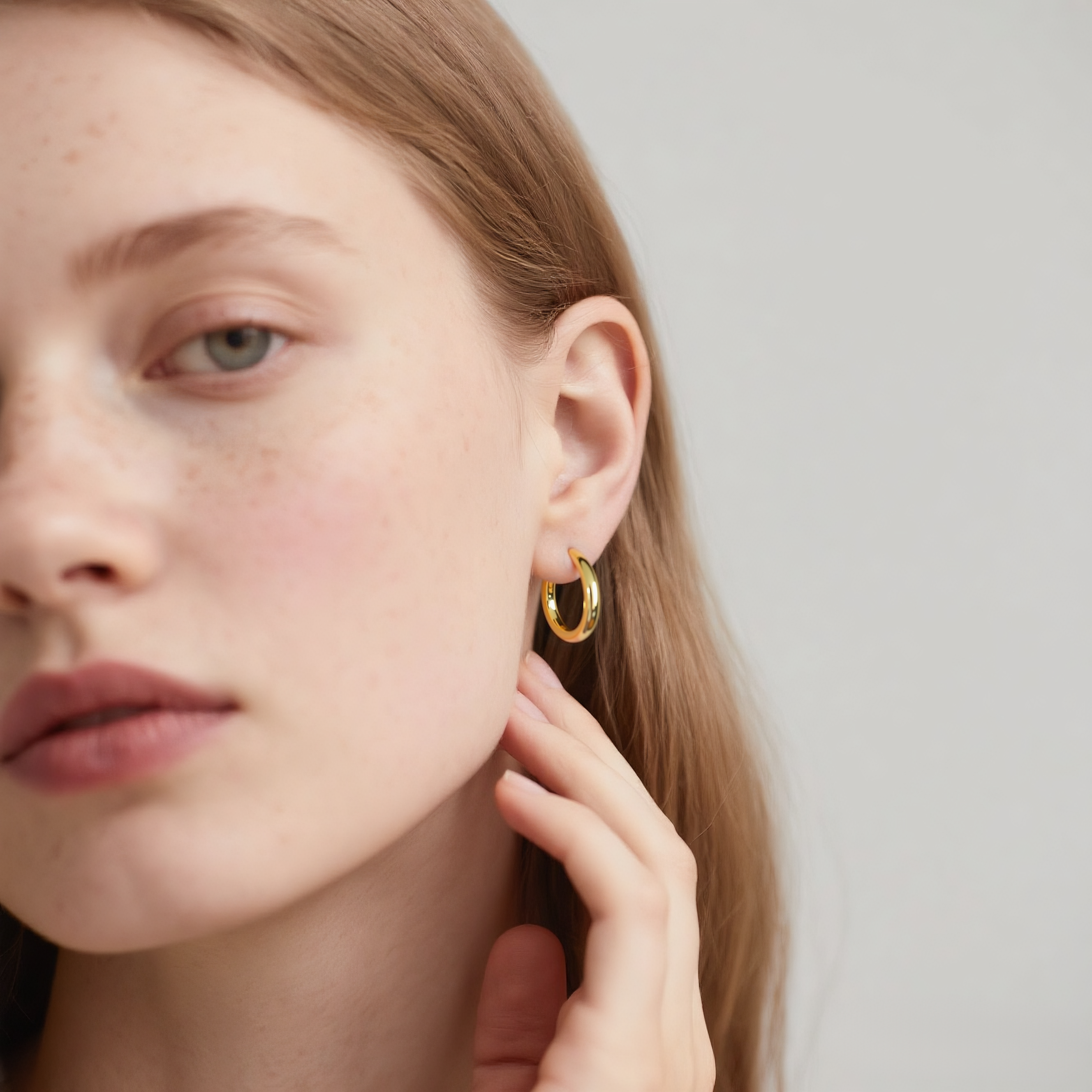 Close-up of Hermin's Classic Gold Everyday Hoops - Soi in 18k gold vermeil over sterling silver, crafted for elegance and durability