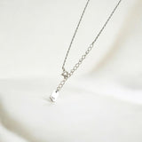 Close-up of Hermin's Tulle Textured Silver Woven Pendant Necklace - Twill in sterling silver with rhodium finish, crafted for elegance and durability