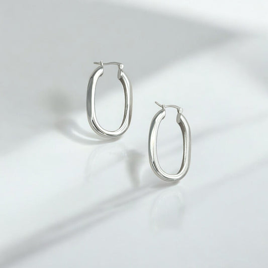 Classic Statement Oval Silver Hoops - Milan made from sterling silver with rhodium finish, minimalist design by Hermin Jewelry