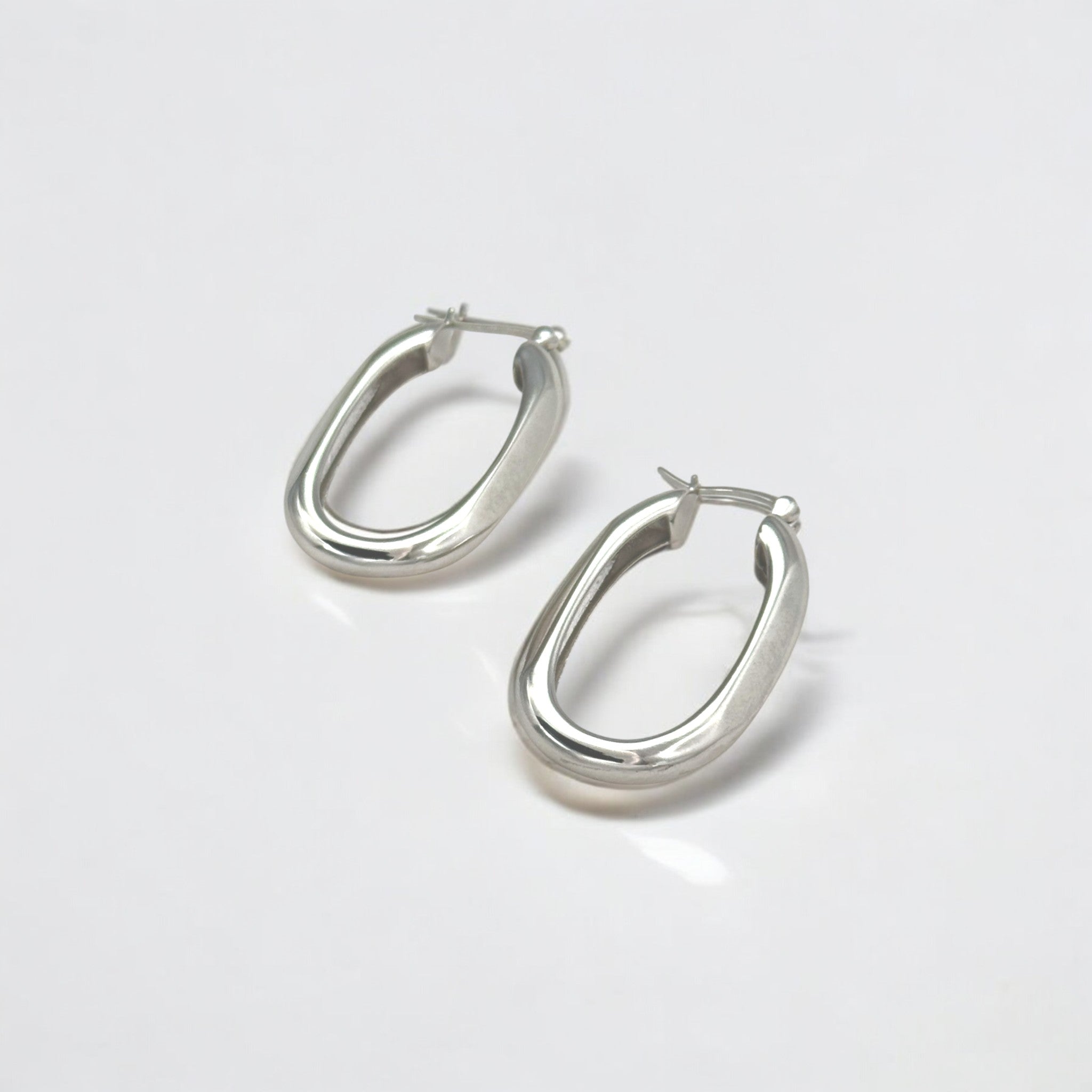 Classic Statement Oval Silver Hoops - Milan crafted with premium sterling silver with rhodium finish, hypoallergenic and tarnish-resistant
