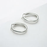 Classic Statement Oval Silver Hoops - Milan made from sterling silver with rhodium finish, minimalist design by Hermin Jewelry