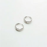 Eclipse Silver Dome Huggie Hoops made from sterling silver with rhodium finish, minimalist design by Hermin Jewelry