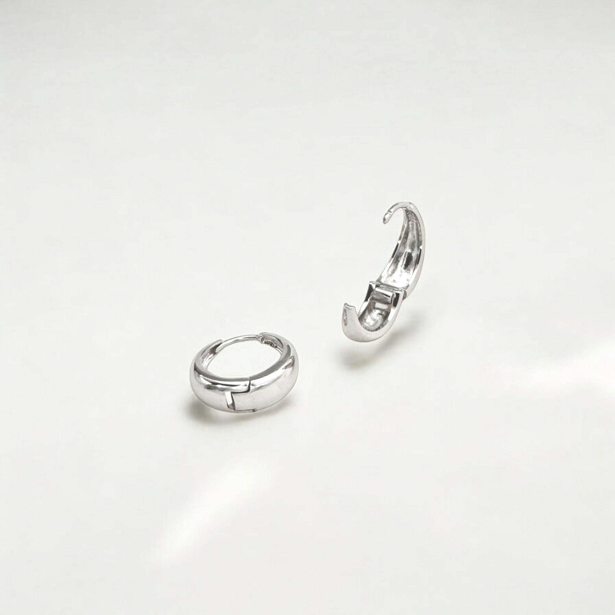Eclipse Silver Dome Huggie Hoops crafted with premium sterling silver with rhodium finish, hypoallergenic and tarnish-resistant