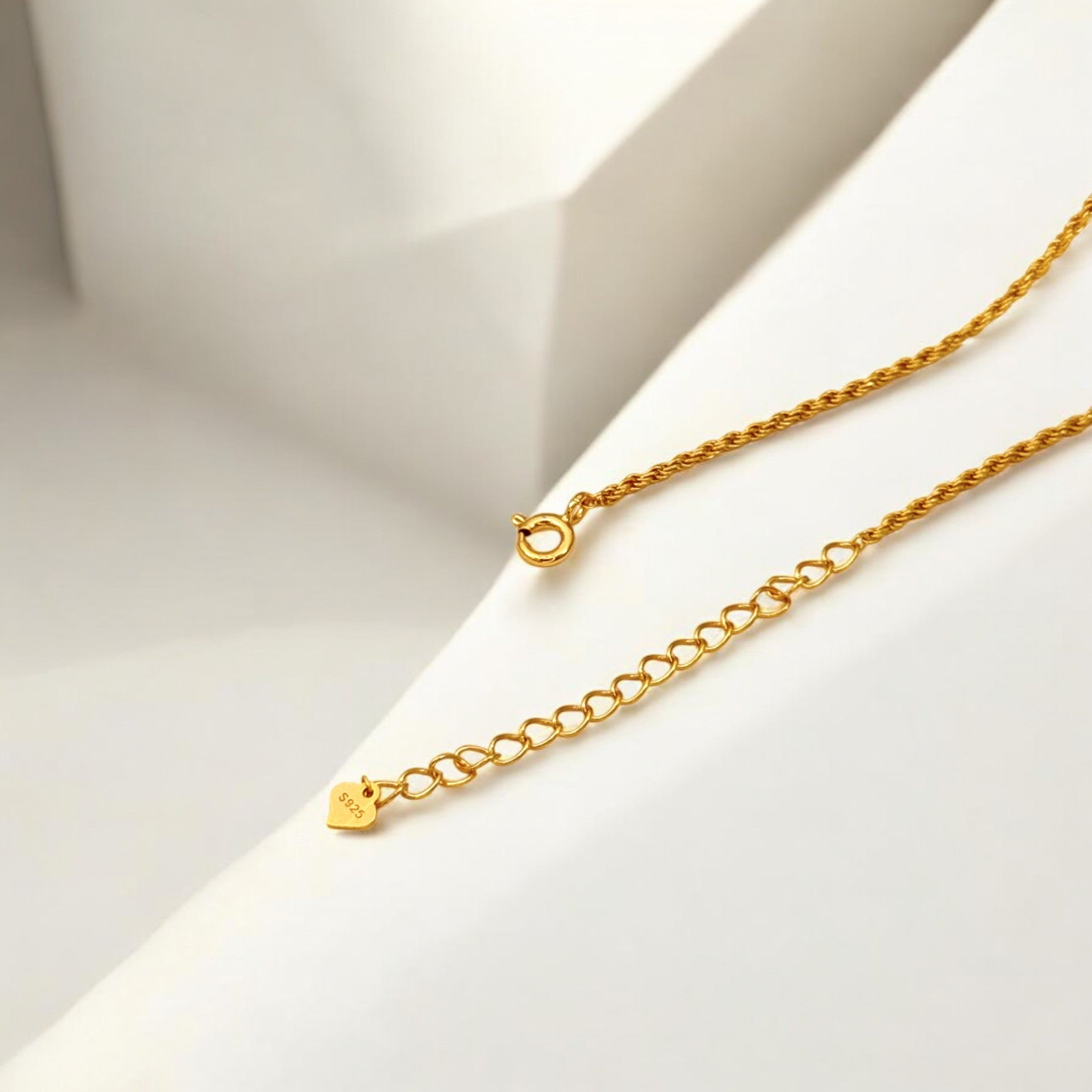 Close-up of Hermin's Gold Teardrop Pendant Necklace - Droplet in 18k gold vermeil over sterling silver, crafted for elegance and durability