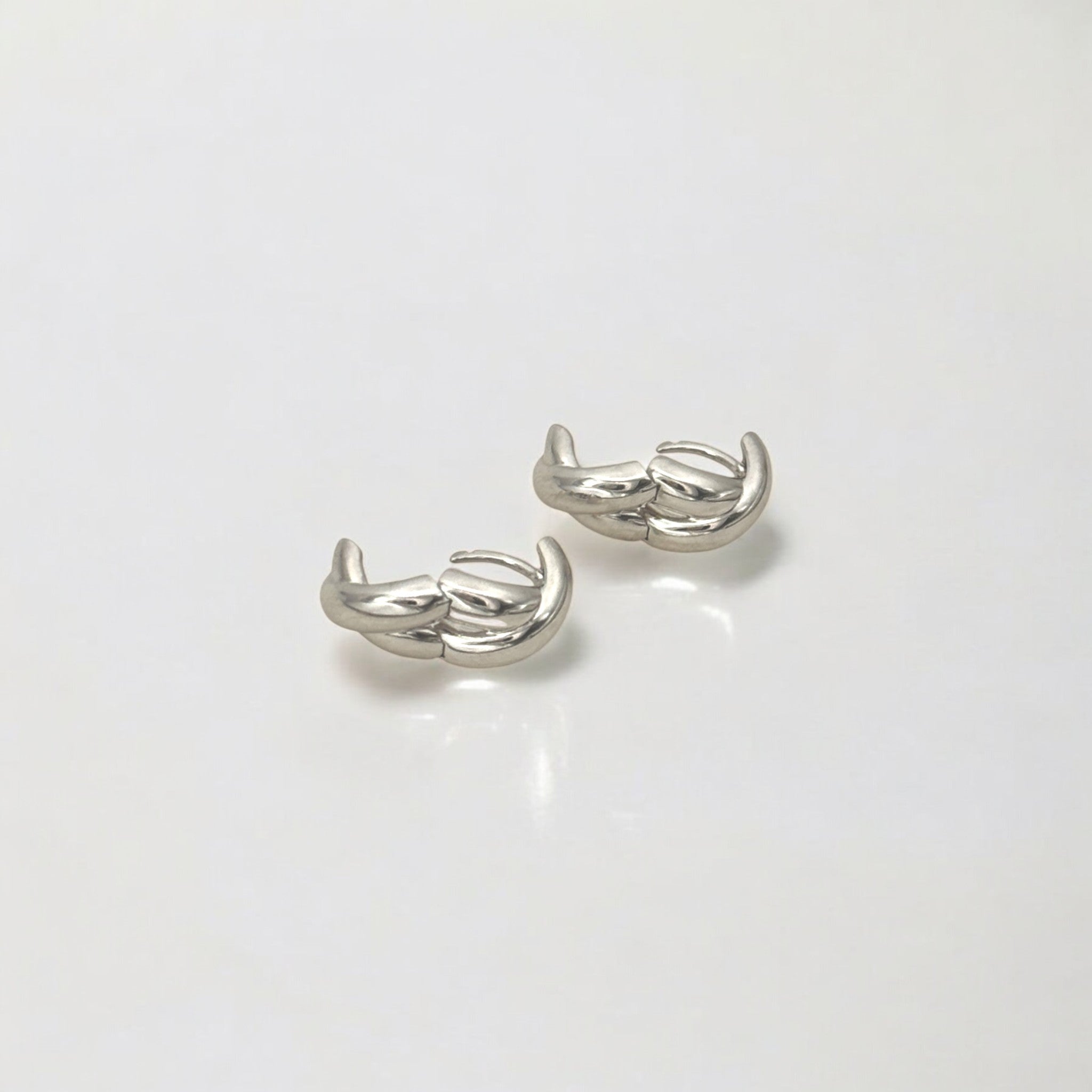 Everyday Silver Twist Huggies - Paris crafted with premium sterling silver with rhodium finish, hypoallergenic and tarnish-resistant