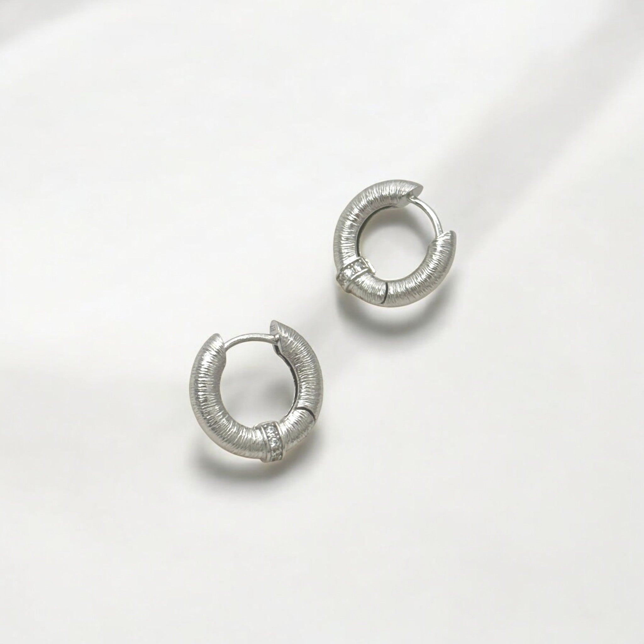 Tulle Silver Sparkle Everyday Hoops crafted with premium sterling silver with rhodium finish, hypoallergenic and tarnish-resistant