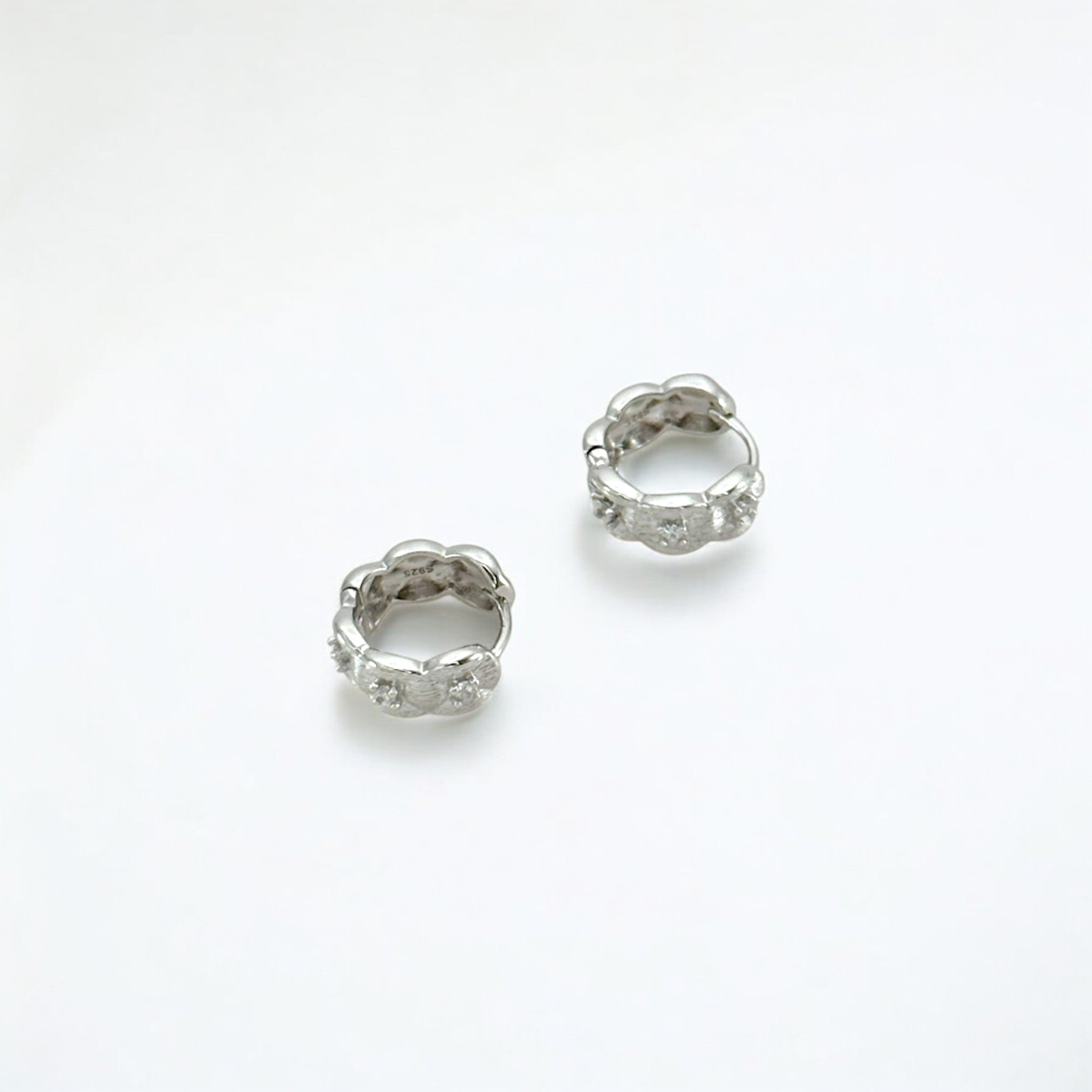 Tulle Textured Silver Woven Sparkle Huggie Hoops made from sterling silver with rhodium finish, minimalist design by Hermin Jewelry