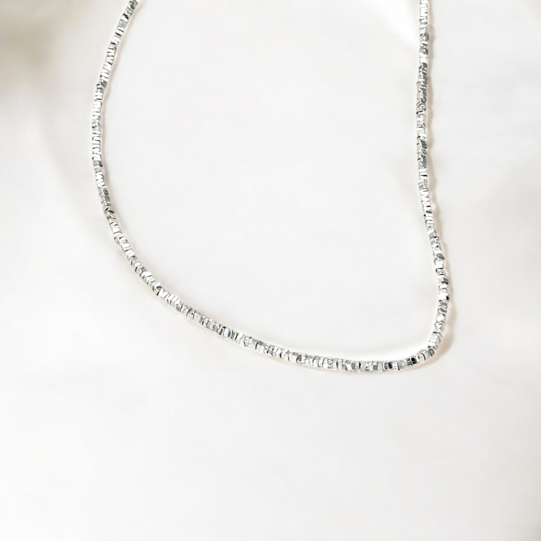 Faceted Silver Bead Necklace - Gleam made from sterling silver with rhodium finish, minimalist design by Hermin Jewelry