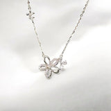 Blossom silver sparkle bloom necklace with CZ flower pendant on sterling silver chain