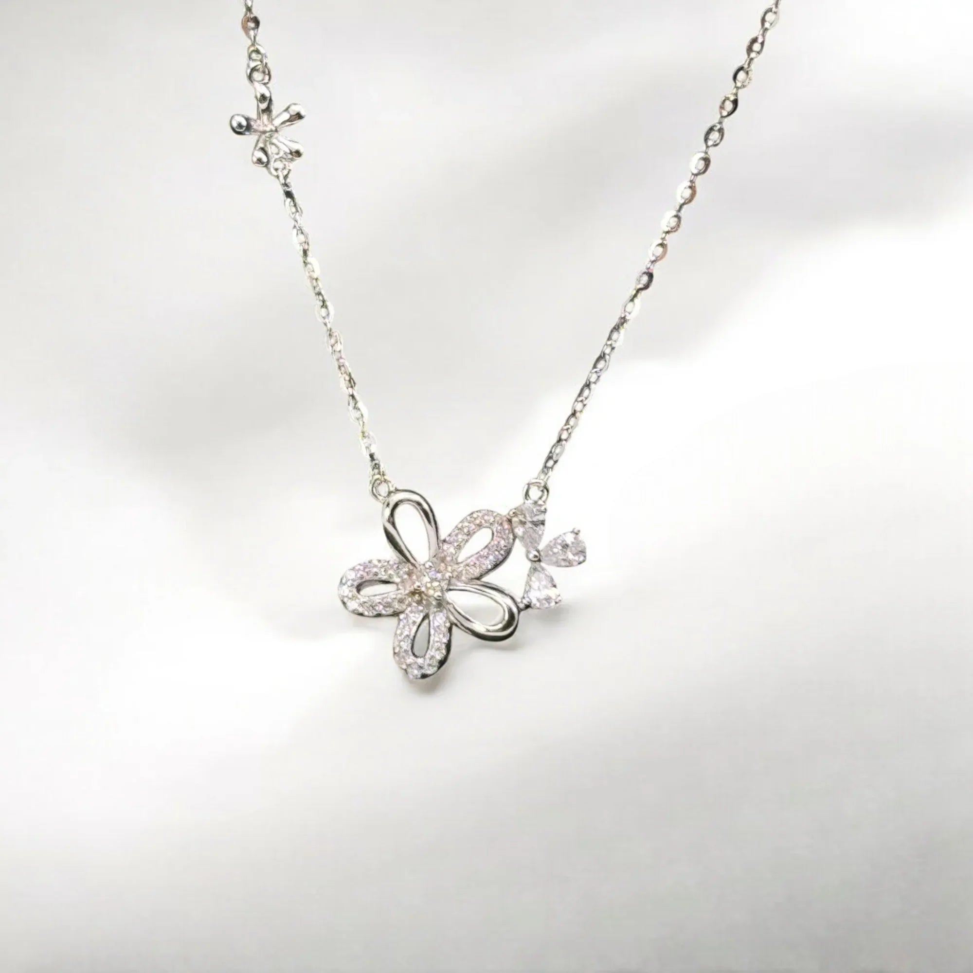 Blossom silver sparkle bloom necklace with CZ flower pendant on sterling silver chain