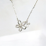 Silver Sparkle Bloom Necklace Blossom with shimmering CZ bloom pendant on a delicate sterling silver chain