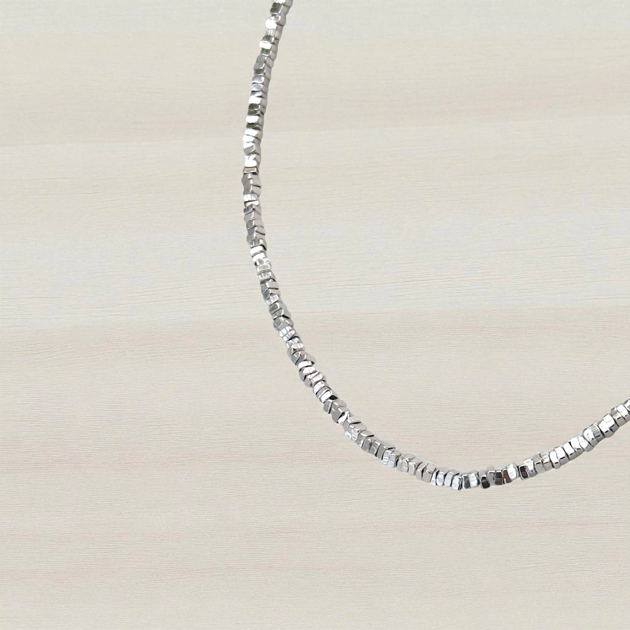 Sterling silver faceted bead necklace for women with rhodium vermeil, hypoallergenic Gleam design

