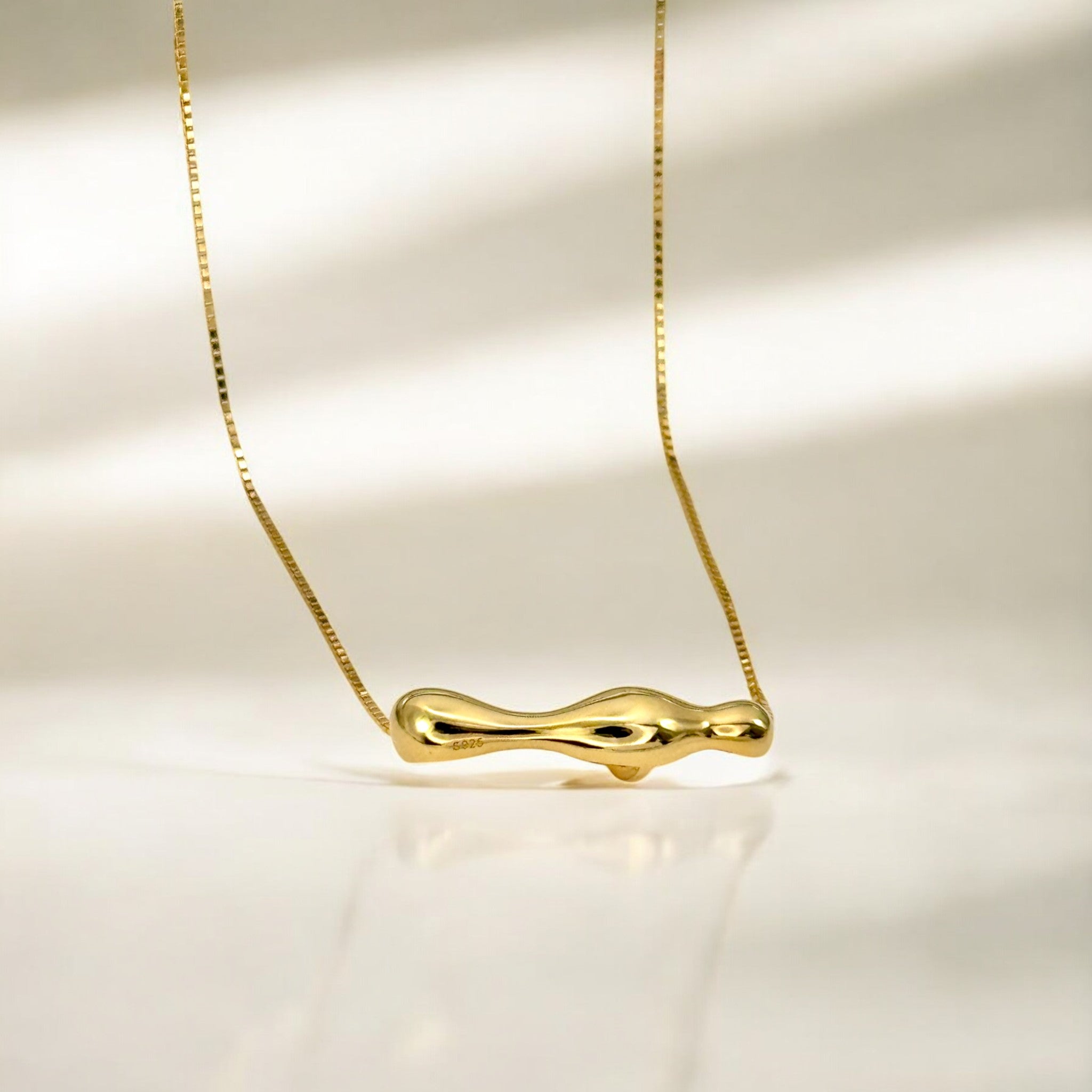 Gold Kinetic Bar Necklace - Dew made from 18k gold vermeil over sterling silver, minimalist design by Hermin Jewelry