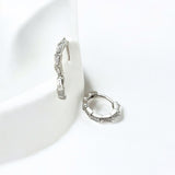 Tapered Baguette Silver Huggie Hoops made from sterling silver with rhodium finish, minimalist design by Hermin Jewelry