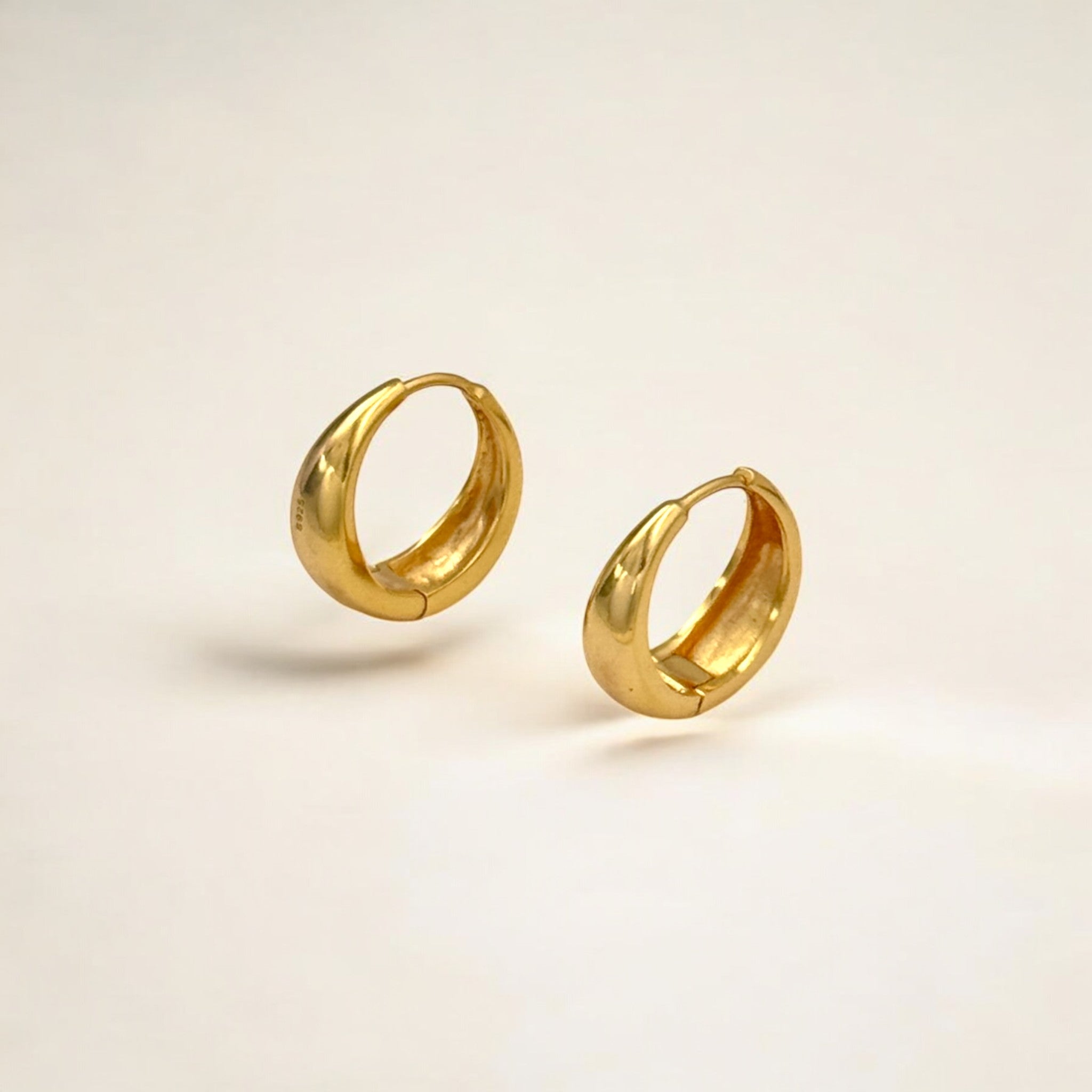 Eclipse Gold Dome Huggie Hoops made from 18k gold vermeil over sterling silver, minimalist design by Hermin Jewelry