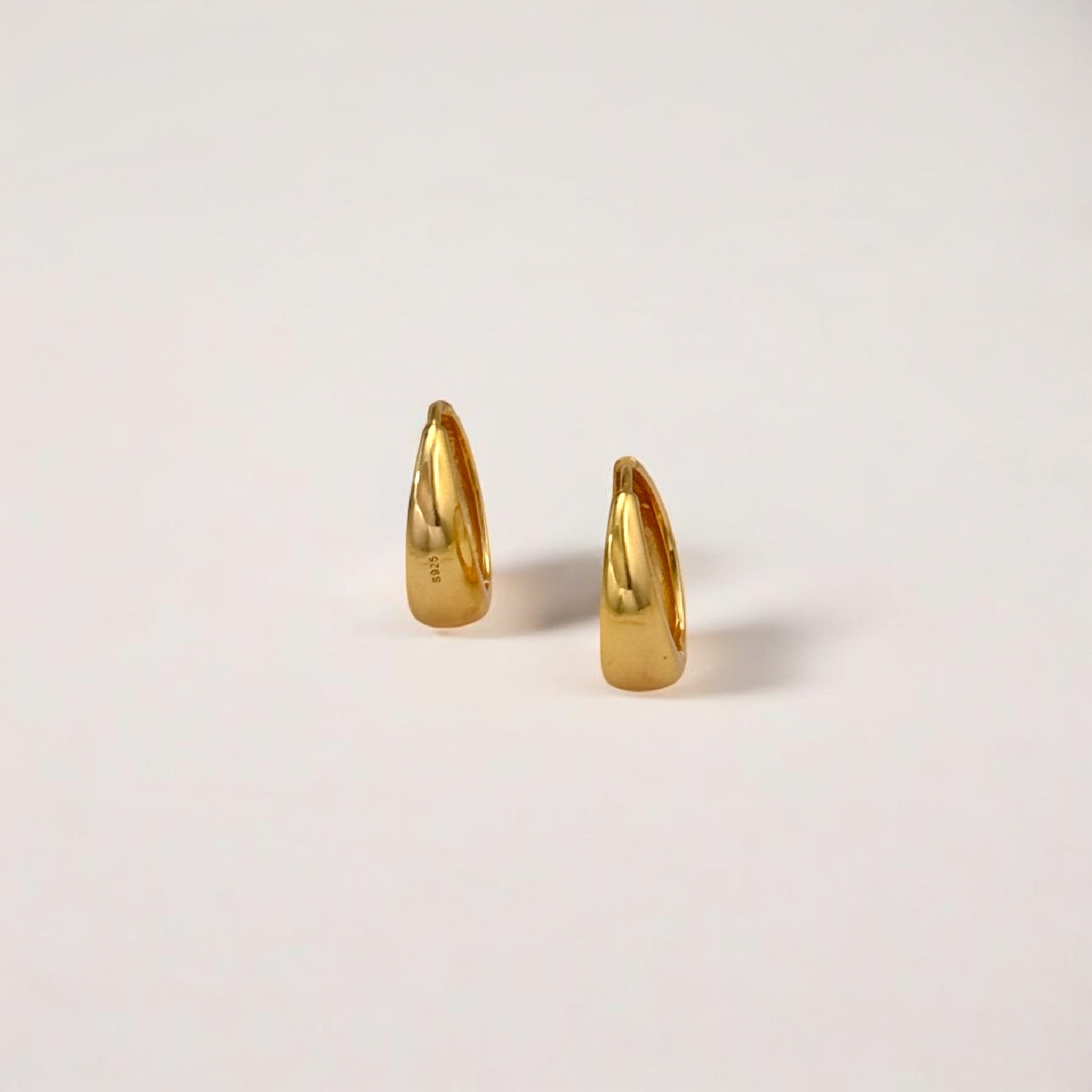 Eclipse Gold Dome Huggie Hoops made from 18k gold vermeil over sterling silver, minimalist design by Hermin Jewelry