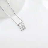 Dainty silver moissanite necklace with round pendant, timeless keepsake gift