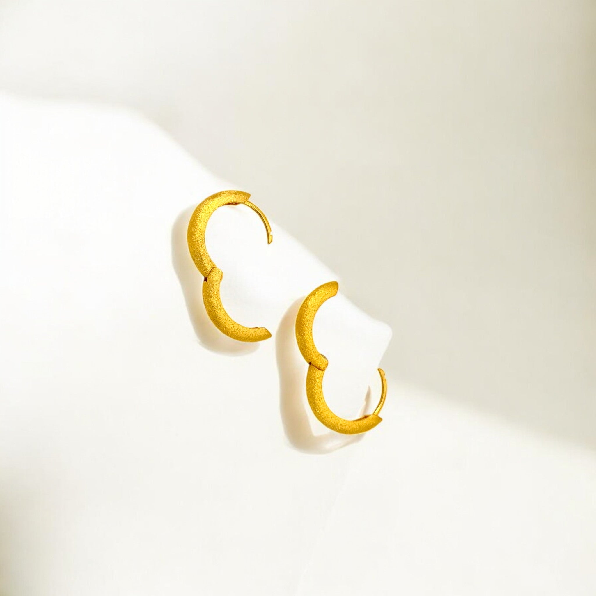 Close-up of Hermin's Tulle Textured Gold Everyday Hoops - 16mm in 18k gold vermeil over sterling silver, crafted for elegance and durability