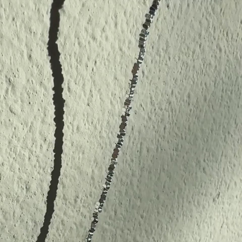 A fine strand of faceted, irregular square shaped beads—like scattered flecks of polished silver. Made from rhodium vermeil over sterling silver. Hermin silver necklace faceted bead necklace